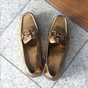 Gucci horse bit loafers. Gold